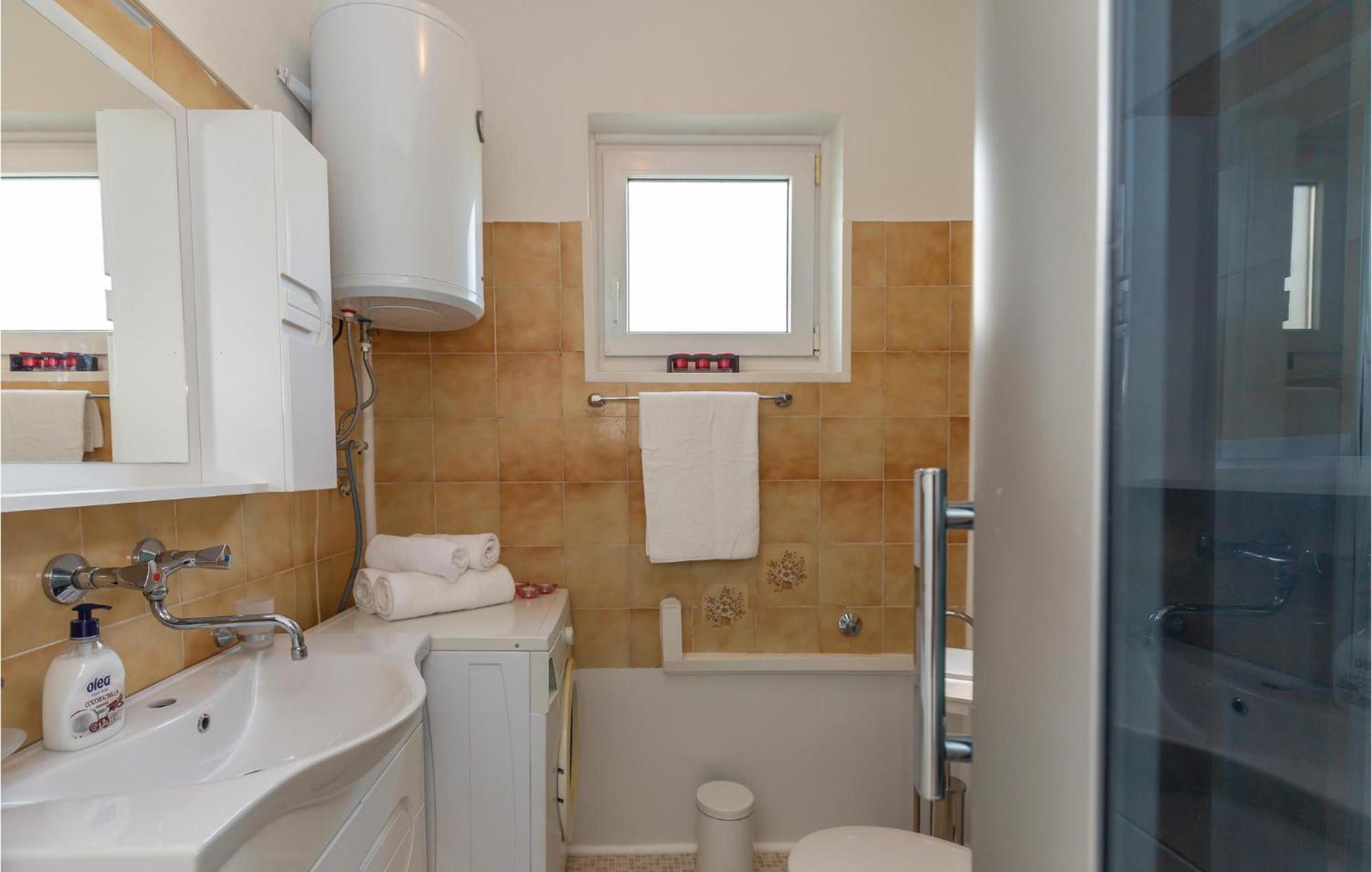 Beautiful Apartment In Metkovic With Kitchen Exterior photo